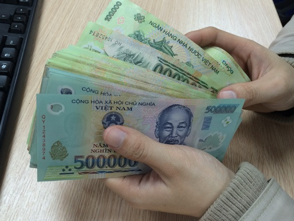 2015: Tháo gỡ điểm nghẽn ngân hàng bằng tổng hòa giải pháp kinh tế ảnh 2