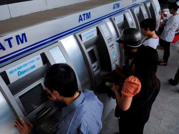 Chuyện kể của những người tiếp quỹ ATM không trọn Tết ảnh 2