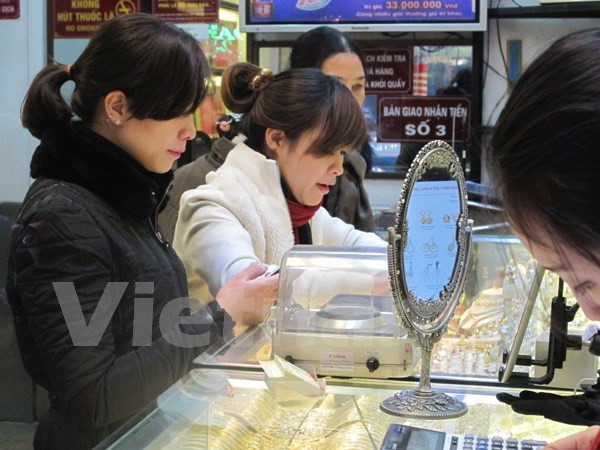 Giá vàng trong nước tăng mạnh, tỷ giá trung tâm giảm 21 đồng ảnh 1