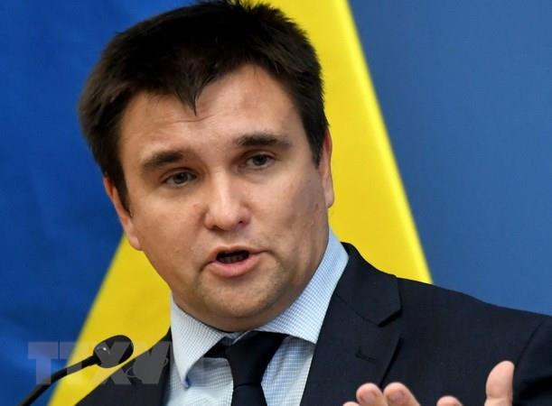 Ukraine chỉ trích Nga đơn giản hóa cấp hộ chiếu cho cư dân miền Đông ảnh 1