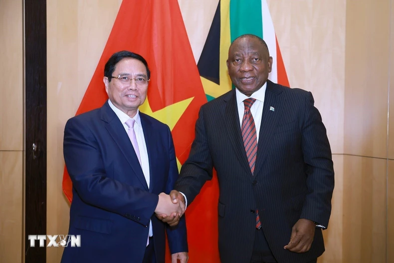 Thủ tướng Phạm Minh Chính hội kiến Tổng thống Cộng hòa Nam Phi, Chủ tịch G20 năm 2025, Matamela Cyril Ramaphosa. (Ảnh: Dương Giang/TTXVN)