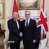 Tổng Bí thư Tô Lâm và Thủ tướng Liên hiệp Vương quốc Anh và Bắc Ireland Keir Starmer. (Ảnh: Thống Nhất/TTXVN)