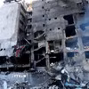 Tòa nhà bị phá hủy sau cuộc không kích của Israel tại Beirut, Liban. (Ảnh: THX/TTXVN)