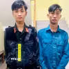 Đối tượng Nguyễn Phạm Hoàng Dương (trái) và Nguyễn Thuận Quý (phải). (Ảnh TTXVN phát)