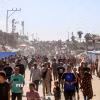 Người dân Palestine trở về nhà tại Dải Gaza, ngày 10/10/2025. (Ảnh: THX/TTXVN)