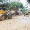 Tỉnh Cao Bằng huy động máy móc khắc phục hậu quả mưa lũ. (Ảnh: Chu Hiệu/TTXVN)