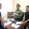 Cơ quan công an khởi tố đối tượng Nguyễn Đức Thịnh (trái). (Ảnh: TTXVN phát)