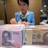 Tiền baht của Thái Lan. (Ảnh: AFP/ TTXVN)