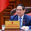 Thủ tướng Phạm Minh Chính chủ trì cuộc họp với các bộ, ngành để chuẩn bị đàm phán thương mại với Hoa Kỳ. (Ảnh: Dương Giang/TTXVN)