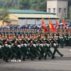 Khối lực lượng vũ trang hợp luyện diễu binh qua lễ đài. (Ảnh: Sỹ Tuyên/TTXVN)