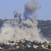 Khói bốc lên sau cuộc không kích của Israel xuống miền Nam Liban. (Ảnh: IRNA/TTXVN)