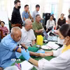 Thu nhận mẫu sinh phẩm ADN thân nhân liệt sĩ chưa xác định được thông tin trên địa bàn tỉnh Lạng Sơn. (Ảnh: Văn Đạt/TTXVN)