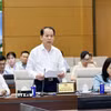 Bộ trưởng Bộ Tư pháp Hoàng Thanh Tùng trình bày báo cáo tiếp thu, giải trình và chỉnh lý dự thảo Luật Hòa giải ở cơ sở (sửa đổi). (Ảnh: Doãn Tấn/TTXVN)
