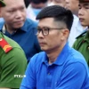 Bị cáo Nguyễn Duy Hưng, cựu Chủ tịch Hội đồng quản trị Tập đoàn Thuận An tại phiên tòa xét xử. (Ảnh: Phạm Kiên/TTXVN)