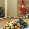 Thủ tướng Phạm Minh Chính tiếp Đại sứ Trung Quốc tại Việt Nam Hà Vĩ. (Ảnh: Dương Giang/TTXVN)