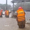 Lực lượng Công an Đắk Lắk có mặt tại các vị trí xung yếu, sẵn sàng ứng phó mưa lũ. (Ảnh: TTXVN phát)