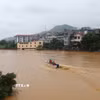 Nước lũ dâng cao trên sông Hiến. (Ảnh: Chu Hiệu/TTXVN.)