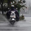 Mưa lớn ảnh hưởng đến hơn 180.000 người. (Ảnh: XInhua)