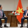 Thủ tướng Phạm Minh Chính tiếp lãnh đạo Tập đoàn MK Group. (Ảnh: Dương Giang/TTXVN)