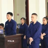 Các bị cáo tại phiên tòa. (Ảnh: Đậu Tất Thành/TTXVN)