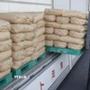 Gạo dự trữ được chuyển tới nhà máy xay xát ở tỉnh Saitama, Nhật Bản, ngày 18/3. (Ảnh: Kyodo/TTXVN)