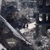 Những tòa nhà tại thành phố Gaza bị phá hủy sau đòn pháo kích của Israel ngày 24/3. (Ảnh: THX/TTXVN)