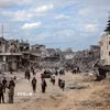 Người dân Palestine tại Dải Gaza. (Ảnh: THX/TTXVN)