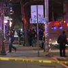 Các lực lượng chức năng liên bang có mặt tại hiện trường vụ xả súng. (Ảnh: AA/TTXVN)