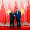 Thủ tướng Phạm Minh Chính hội kiến Tổng Bí thư, Chủ tịch nước Trung Quốc Tập Cận Bình. (Ảnh: Dương Giang/TTXVN)