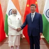 Thủ tướng Ấn Độ Narendra Modi (trái) và Chủ tịch Trung Quốc Tập Cận Bình tại cuộc gặp ở Thiên Tân, Trung Quốc ngày 31/8/2025. (Ảnh: ANI/TTXVN)