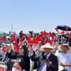 Cộng đồng người Việt Nam tại Nhật Bản hào hứng tham gia Festival “50 năm hòa chung một nhịp đập” chào mừng 50 năm thống nhất đất nước. (Ảnh: Nguyễn Tuyến/TTXVN)