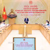 Quang cảnh Hội nghị công bố Nghị định về phân cấp, phân quyền khi tổ chức chính quyền địa phương 2 cấp. (Ảnh: Phạm Kiên/TTXVN)