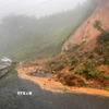 Mưa lớn gây sạt lở tại Km195 trên đường Hồ Chí Minh nhánh tây thuộc địa phận xã Hướng Việt, huyện Hướng Hóa (Quảng Trị). (Ảnh: TTXVN phát)