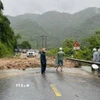 Mưa lớn gây sạt lở tại Km280 Hồ Chí Minh nhánh Tây. (Ảnh: TTXVN phát)