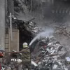 Cảnh đổ nát sau cuộc không kích tại Tehran, Iran, ngày 23/3/2026. (Ảnh: THX/TTXVN)