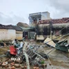 Nhà cửa của người dân tại xã Hoằng Giang (Thanh Hóa) bị gió bão đánh sập và tốc mái ngổn ngang. (Ảnh: Việt Hoàng/TTXVN)