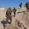 Binh sỹ Israel tiến hành hoạt động quân sự tại Dải Gaza. (Ảnh: THX/TTXVN)