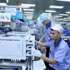 Công ty TNHH Công nghiệp chính xác EVA, vốn đầu tư của Hồng Kông (Trung Quốc) tại khu công nghiệp, đô thị VSIP Hải Phòng, chuyên sản xuất linh kiện điện tử cho máy văn phòng. (Ảnh: Danh Lam/TTXVN)