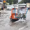 Cảnh ngập lụt sau những trận mưa lớn do ảnh hưởng của bão Wipha tại Quezon, Philippines. (Ảnh: THX/TTXVN)