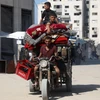 Người dân Palestine đi sơ tán tránh xung đột tại Gaza. (Ảnh: THX/TTXVN)