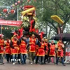 Lễ rước kiệu truyền thống trong Lễ hội văn hóa dân gian Phố Hiến. (Ảnh: Đinh Văn Nhiều/TTXVN)