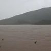 Nước sông Thu Bồn dâng cao. (Ảnh: Anh Dũng/TTXVN)
