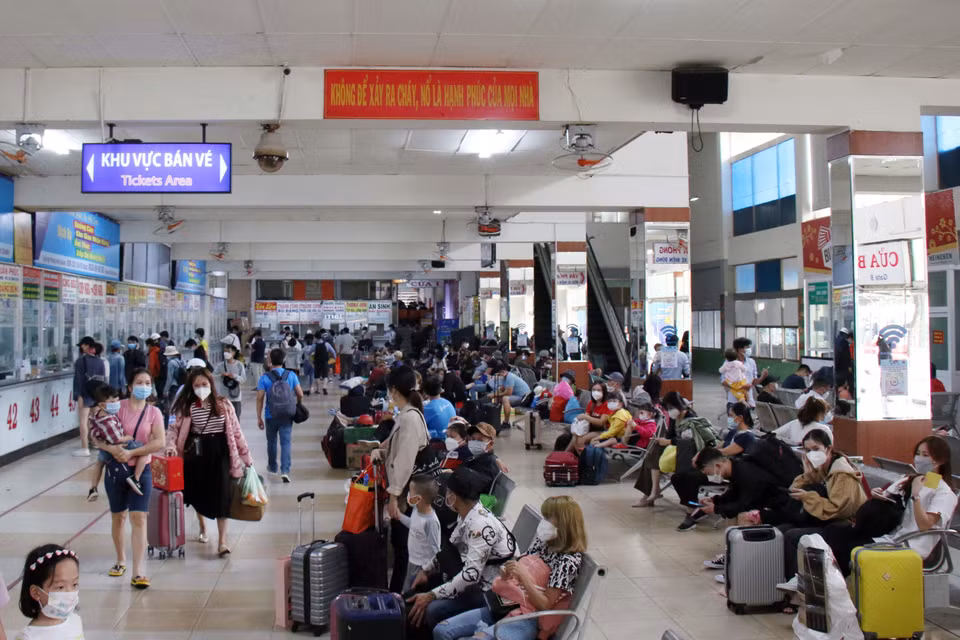 Bến xe miền Đông nhộn nhịp trong chiều 26 Tháng Chạp. (Ảnh: Tiến Lực/TTXVN)