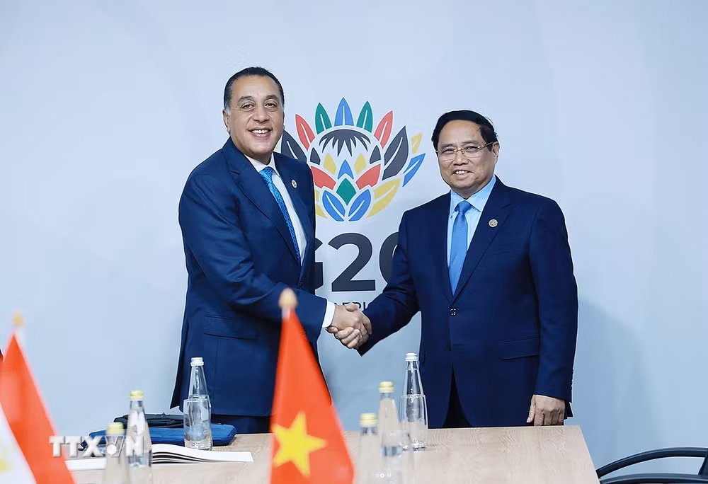 ttxvn-thu-tuong-pham-minh-chinh-gap-thu-tuong-ai-cap-mostafa-madbouly-8427983-3.jpg