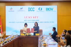 Sở giao dịch Chứng khoán Hà Nội ký kết các Biên bản phối hợp với Tổng công ty Lưu ký và Bù trừ Chứng khoán Việt Nam. (Ảnh: Vietnam+) 