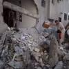 Đống đổ nát sau cuộc không kích của Israel xuống Dải Gaza. (Ảnh: THX/TTXVN)