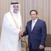 Thủ tướng Phạm Minh Chính tiếp Bộ trưởng Bộ Thông tin và Công nghệ Truyền thông Qatar Mohammed bin Ali bin Mohammed Al Mannai. (Ảnh: Dương Giang/TTXVN)