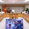 Phó Thủ tướng Trần Lưu Quang phát biểu. (Ảnh: Doãn Tấn/TTXVN)