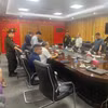Thực hiện Lệnh bắt tạm giam Tổng Giám đốc Tổng công ty máy động lực và máy nông nghiệp Việt Nam. (Ảnh TTXVN phát)
