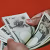 Đồng tiền mệnh giá 10.000 yen của Nhật Bản. (Ảnh: AFP/TTXVN)